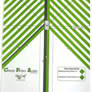 May include: A white quilting template with green diagonal stripes and the text "Clearly Perfect Angles" and "New Leaf Stitches". Includes a fabric alignment key with stitching instructions.