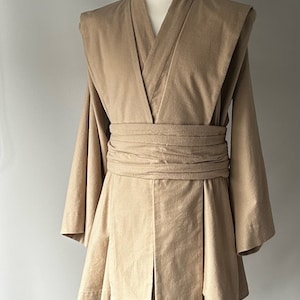 Star Wars Jedi-tunikaset, beställningsvara. Mjuk flanell i 100 % bomull, beige.
