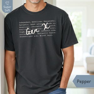 ChatGPT said:

Pepper gray Comfort Colors Gen X humor t-shirt featuring witty and satirical Gen X traits in a typewriter-style print with handwritten “Gen X” overlay. Made from 100% ring-spun cotton, garment-dyed for a soft, vintage feel, and pre-shrunk for everyday comfort. Shown on model in casual indoor setting, styled with jeans for a relaxed look. Perfect for Generation X adults who love sarcasm, 80s 90s nostalgia, and authentic humor. Great funny Gen X gift or laid-back feel