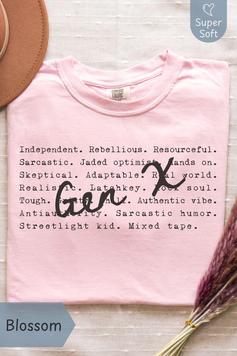 Blossom pink Comfort Colors Gen X humor t-shirt featuring sarcastic and satirical Gen X traits in a black typewriter-style font with handwritten “Gen X” overlay. Made from 100% ring-spun cotton, garment-dyed for a soft, vintage feel, and pre-shrunk for long-lasting comfort. Displayed flat with a tan hat and dried flowers for a warm, nostalgic aesthetic. Perfect for Generation X adults who appreciate humor, retro 80s 90s vibes, and authentic self-expression. Great funny Gen X gift
