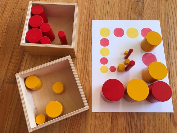 Red knobless cylinders montessori 2025
