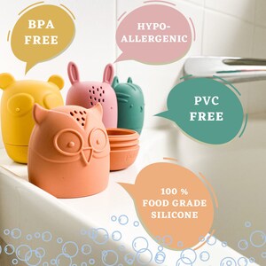 K&ouml;nnte beinhalten: Vier farbenfrohe Silikonbeh&auml;lter in Tierform, darunter ein Eule, ein B&auml;r, ein Hase und eine Katze. Die Beh&auml;lter sind mit "BPA Frei", "Hypoallergen", "PVC Frei" und "100% Lebensmittelqualit&auml;t Silikon" gekennzeichnet.