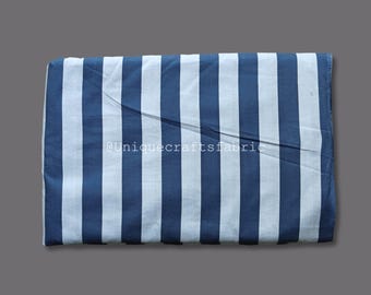May include: White and blue striped fabric with a blue stripe width of approximately 1 inch. The fabric is folded in half and the text "@Uniquecraftsfabric" is visible.