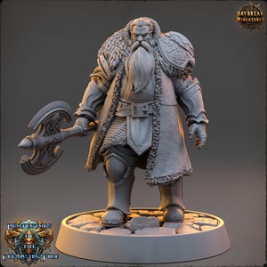 May include: A gray painted miniature figurine of a dwarf warrior wearing a fur-lined cloak and holding a double-headed axe. The miniature is standing on a circular base with a stone texture. The miniature is part of the "Protectors of the Cleansing Fire" series.