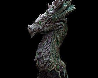 May include: A detailed, sculpted dragon bust made of a light gray and green material. The dragon has a textured, bark-like surface and green eyes. The bust is mounted on a black base.