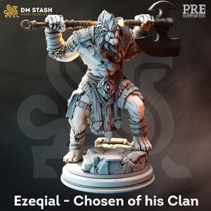 May include: A white, detailed miniature figurine of a wolf-like creature wielding a large axe. The creature is wearing a kilt and has a fierce expression. The figurine is standing on a rocky base. The text "Ezeqial - Chosen of his Clan" is printed below the figurine.