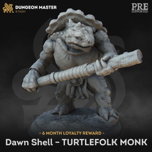 May include: A grey 3D printed miniature of a turtlefolk monk holding a staff. The miniature is standing on a round base. The text "Dawn Shell - Turtlefolk Monk" is printed below the base. The text "6 Month Loyalty Reward" is printed above the base.