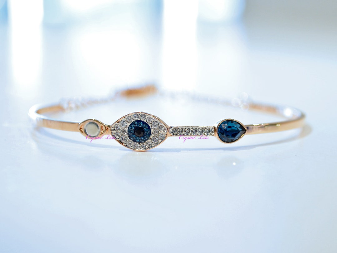 Buy Swaovski Symbolic Evil Eye Bangle Rose Gold Plated Authentic