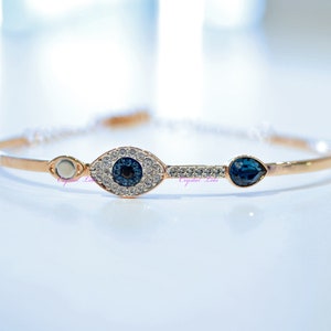 SWAROVSKI Evil Eye ブレスレット スワロフスキー バングル Amazon.com: SWAROVSKI Crystal Evil Eye Rose Gold-Plated