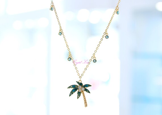 Swarovski palm tree necklace best sale