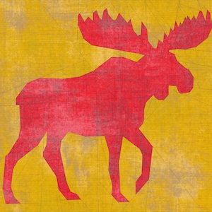 May include: A red moose silhouette on a yellow background. The moose is made of paper and has a geometric design.