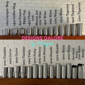 May include: A selection of stainless steel tumblers, mugs, and bottles in various sizes, ranging from 8 ounces to 32 ounces. The tumblers and mugs are all silver, and the bottles are silver with a black lid. The text "DESIGNS GALORE" is printed on a banner above the products.