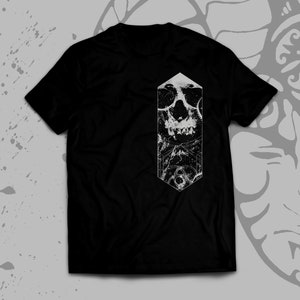 May include: Black t-shirt with a white graphic of a skull in a geometric shape.