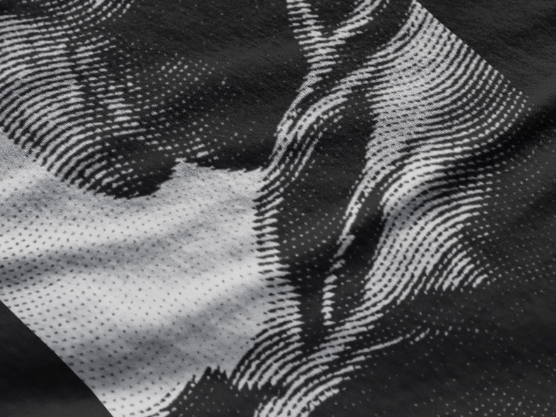 May include: Black and white abstract graphic print on a black fabric. The print is made up of lines and dots.