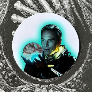 Pegatina David 8 reflexionando sobre el orbe