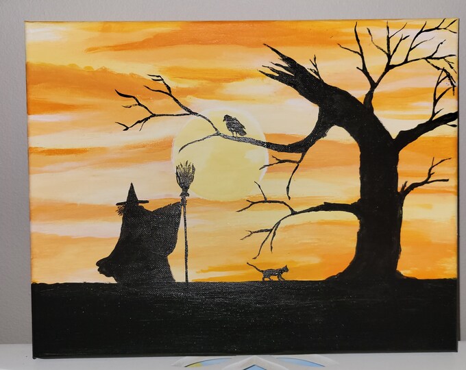 Witch and black cat painted with my grandson