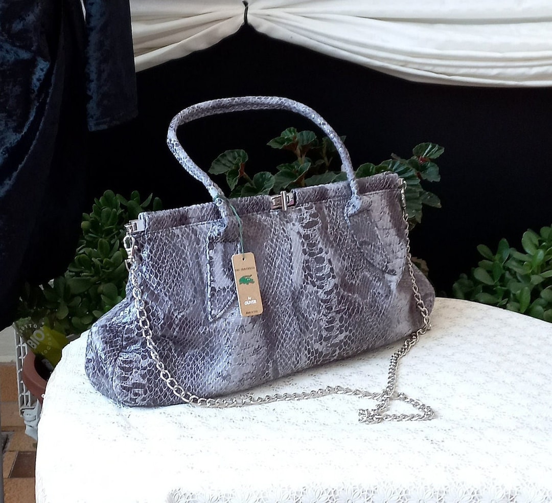 Crocodile vintage handbag restoration
