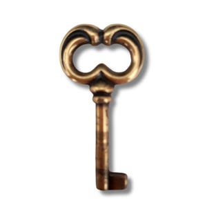 May include: A vintage-style key with a decorative head and a rectangular key bit. The key is made of a bronze-colored metal and has a detailed, ornate design. The key is a classic decorative element.