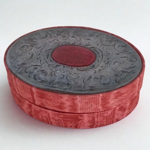Large Jewelry box covered in brick red silk, Silver Lid, Branded Very worked