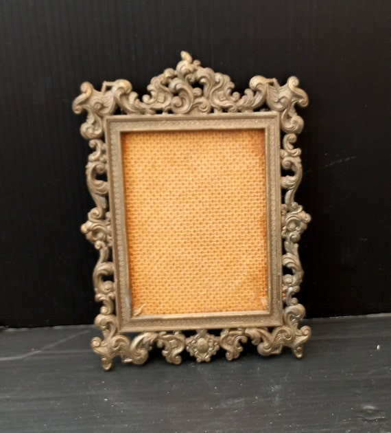 Decorated brass frame, picture holder