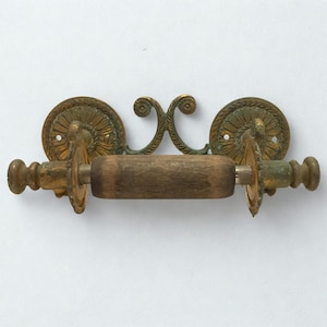 May include: A set of three ceramic mugs with a speckled, matte finish. The mugs are in shades of cream, light grey, and dark grey. Each mug has a simple, minimalist design, ideal for coffee or tea.