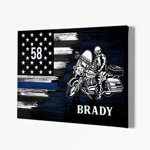May include: A black and white illustration of a police officer riding a motorcycle with a thin blue line American flag background. The officer's badge number is 58 and the name "BRADY" is printed below the motorcycle.