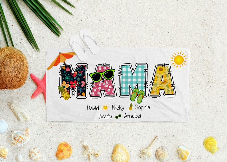 May include: White beach towel with the word "MAMA" spelled out in colourful letters. Each letter is decorated with a different summer-themed pattern. The letters are outlined in black and have stitching details. Below the word "MAMA" are the names "David, Nicky, Sophia, Brady, Amabel" written in black text.