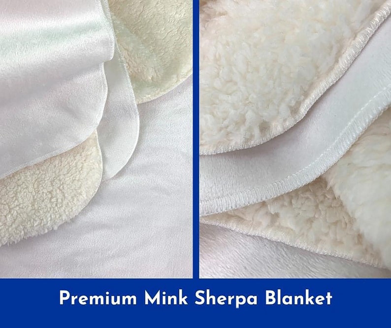 May include: Close-up of a white blanket with a soft, plush texture. The blanket is made of two layers, a smooth outer layer and a fluffy inner layer. The blanket is folded in half, showing the different layers.  Premium Mink Sherpa Blanket.