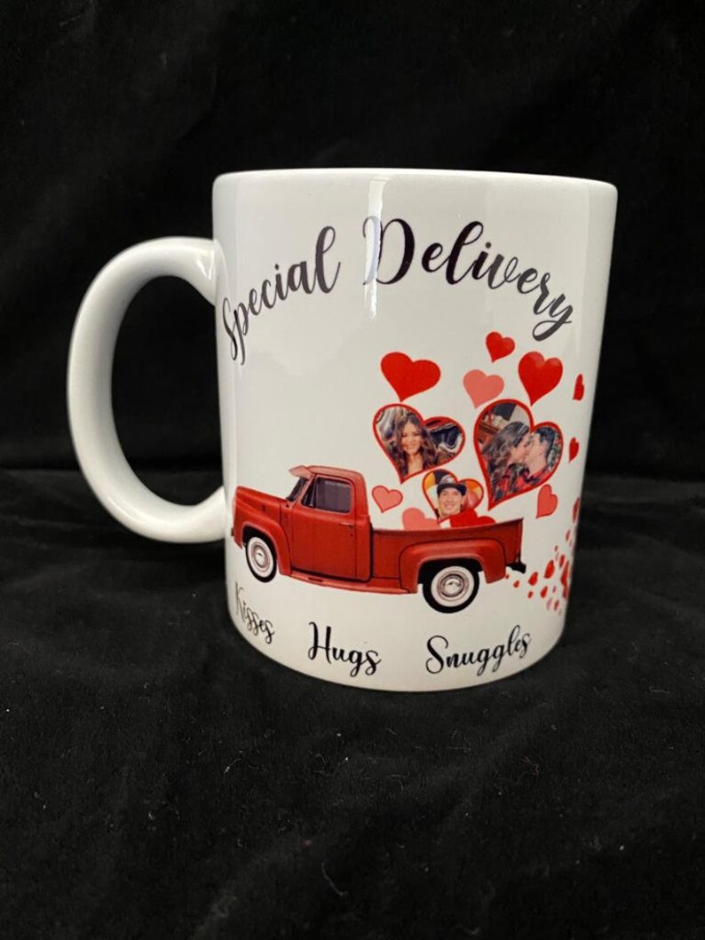 May include: White ceramic mug with a red pickup truck and hearts printed on it. The text "Special Delivery" is printed on the mug. The text "Hugs, Kisses, Snuggles" is printed on the bottom of the mug.