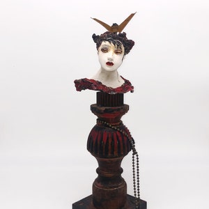 Lady on a Pedestal- Ceramic figurative sculture  assembled with found ojects