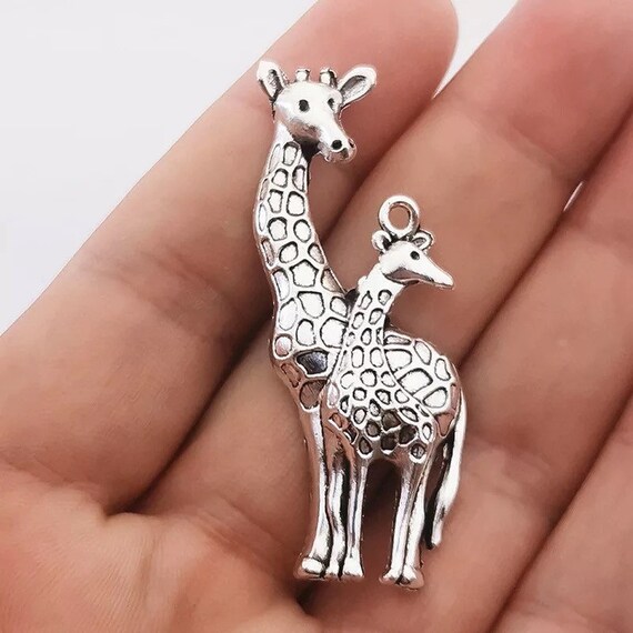 silvertone mother and baby giraffe pendant 