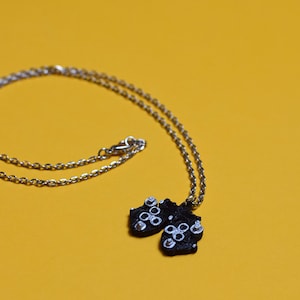Phoropter pendant necklace