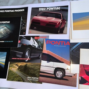 x12- vintage dealership sales brochure catalog lot Pontiac American made automobile auto automotive books car prints foldouts illustrations