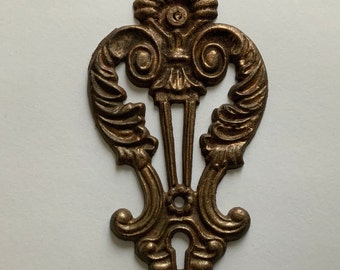 Antique old Escutcheon Cast Iron Escutcheons Ornate Gold Colored Key Hole Cover