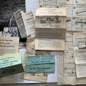 LOT: Lionel Train Instruction Manuals Directions collection of 13 pamphlets and large Train Conductor photograph 1