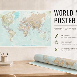 May include: A world map poster featuring a light blue ocean background and tan continents with black text labels. The text reads WORLD MAP POSTER UNFRAMED PAPER POSTER, UNTEARABLE, FADE-RESISTANT, and ECO-FRIENDLY & NON-TOXIC. One poster is rolled up.