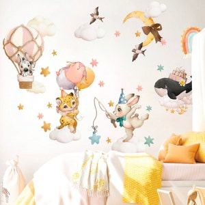 May include: A set of colourful animal-themed wall decals featuring a zebra in a hot air balloon, a leopard holding balloons, a rabbit with a party hat fishing, and a whale with a gift box. The decals are perfect for a nursery or child's room.