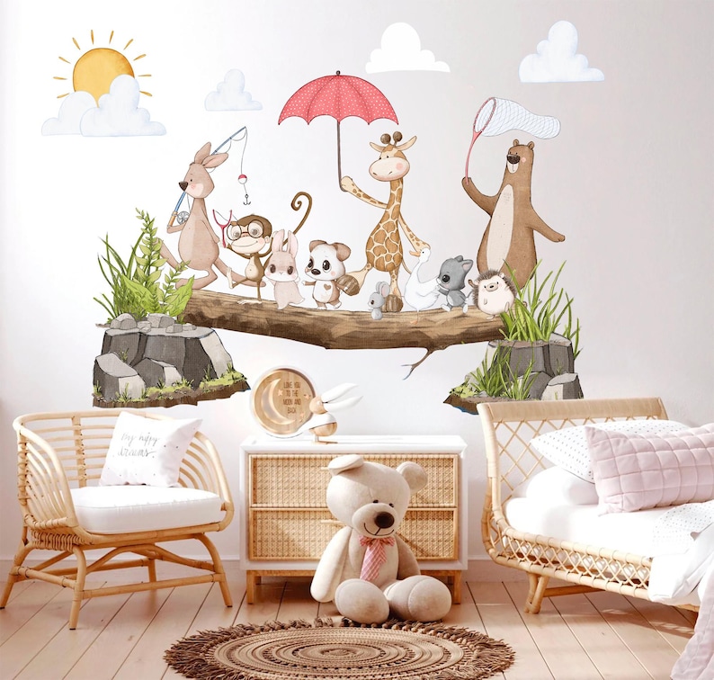 May include: A set of animal wall decals featuring a giraffe, monkey, kangaroo, bear, and other woodland creatures. The decals are arranged on a tree branch with a pink umbrella and a net. The decals are perfect for a child's bedroom or playroom.