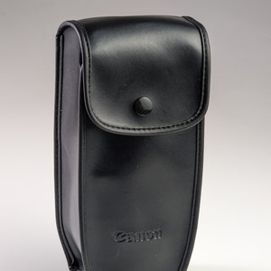 May include: A set of three ceramic mugs with a speckled, matte finish. Each mug is a different colour: light blue, cream, and grey. The mugs have a simple, modern design and a comfortable handle.