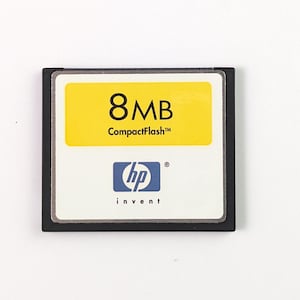 May include: A handmade wooden sign saying "Welcome to our home" in a handwritten style. The sign is painted white with a dark stained frame. A small, decorative heart is in the bottom right corner.