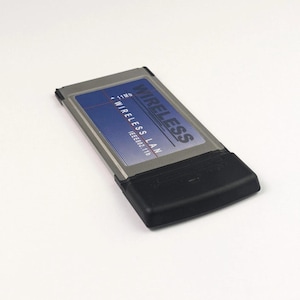Scheda WiFi PCMCIA Atmel Fastvnet 502A-D vintage 802.11 b (11 Mbps) in custodia originale