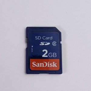 Rara scheda SD SanDisk vintage da 2 GB Classe 2 Scheda di memoria per vecchie fotocamere