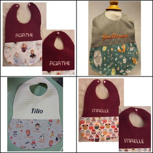 May include: Four different baby bibs with embroidered names. The bibs are made of a waffle-weave fabric and have a cotton print on the bottom. The names on the bibs are Agathe, Guillaume, Tilio, and Maelle.