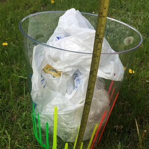 clear plastic garbage can