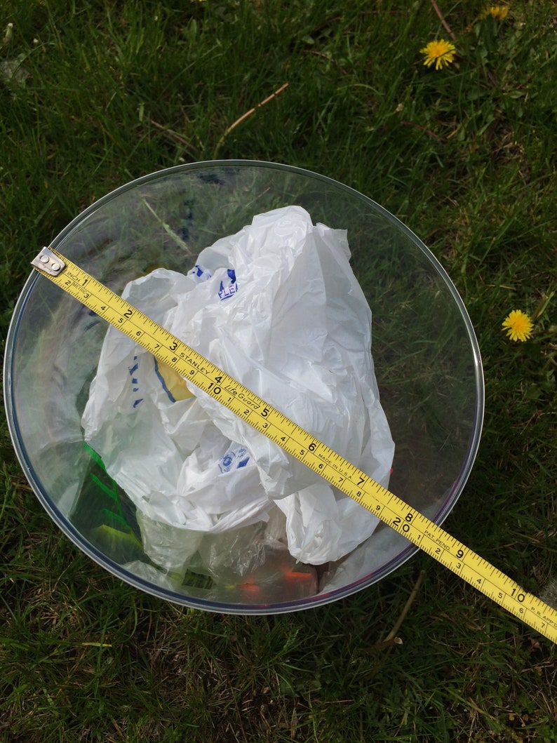 clear plastic garbage can