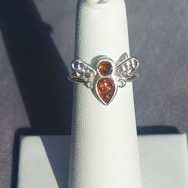 Genuine Baltic Cognac Amber Bee Ring with 925 Sterling Silver Intricate Wings. Amber is from the Poland Lithuania Area Mines.