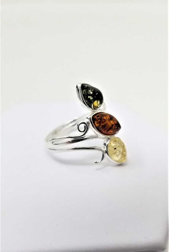 3 Authentic Baltic Multi-color Amber Gemstones Set in a Beautiful