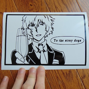 May include: Black and white illustration of a man in a suit raising a glass with the text "To the stray dogs" in a speech bubble.