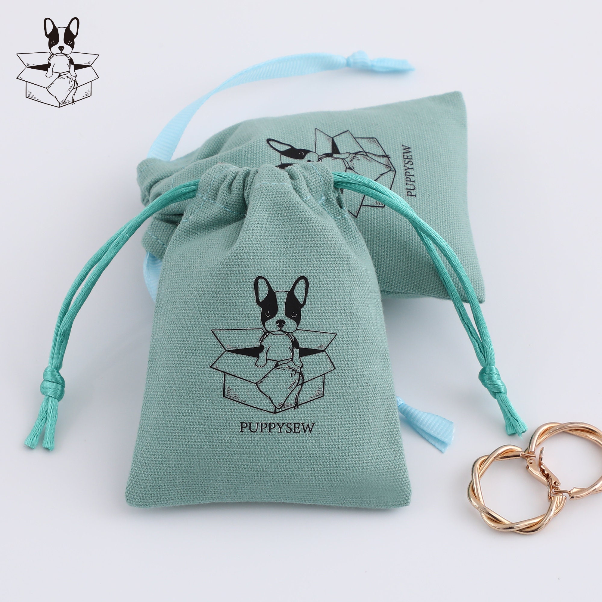 Tips for Choosing Blue Cotton Canvas Ribbon Bags: durable cotton canvas material with smooth texture for reliable gift packaging