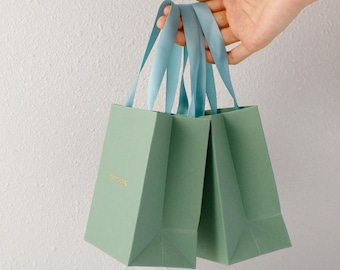 Cajas de embalaje para joyería con logotipo personalizado, bolsas de papel, estuches, marca personalizada.
